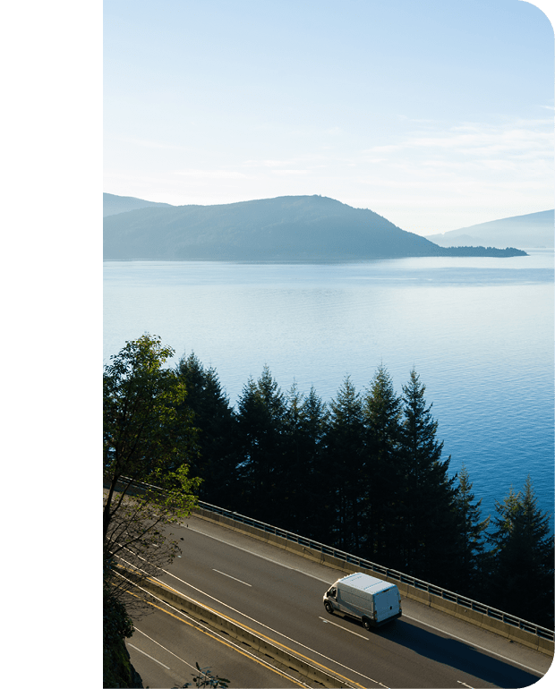 Delivery truck driving along Highway 99, BC, Canada