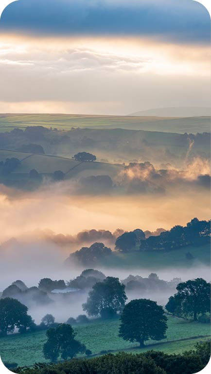 A stunning sunrise on a misty and foggy morning around the valleys of Whaley Bridge and Chapel-en-le-Frith in Derbyshire. UK